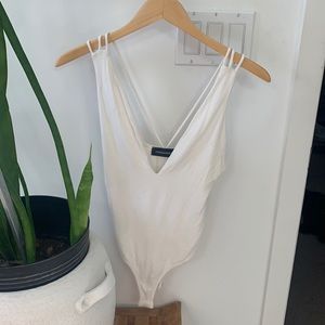 Naked wardrobe bodysuit. Size M